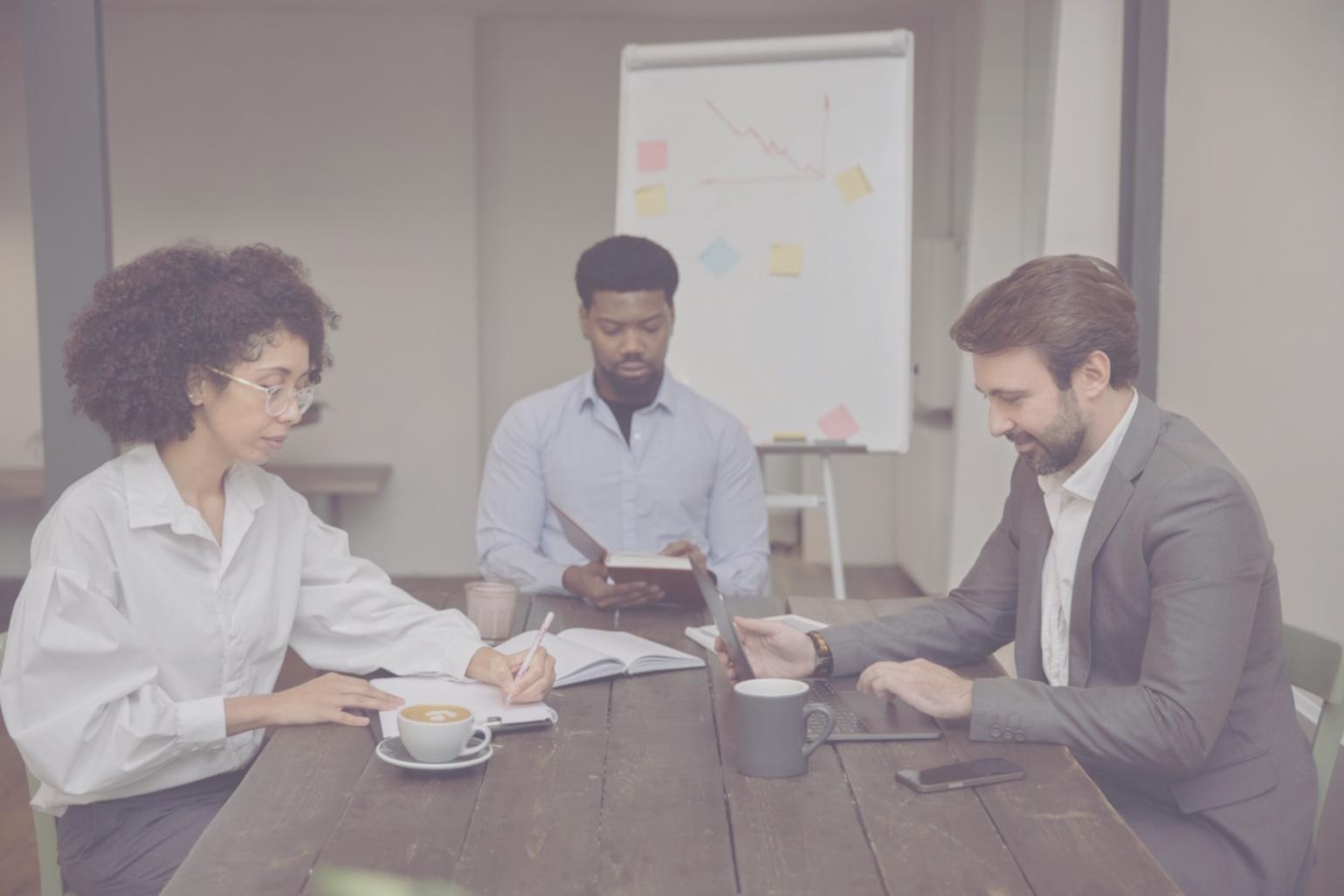 Business strategy session reviewing financial scenarios